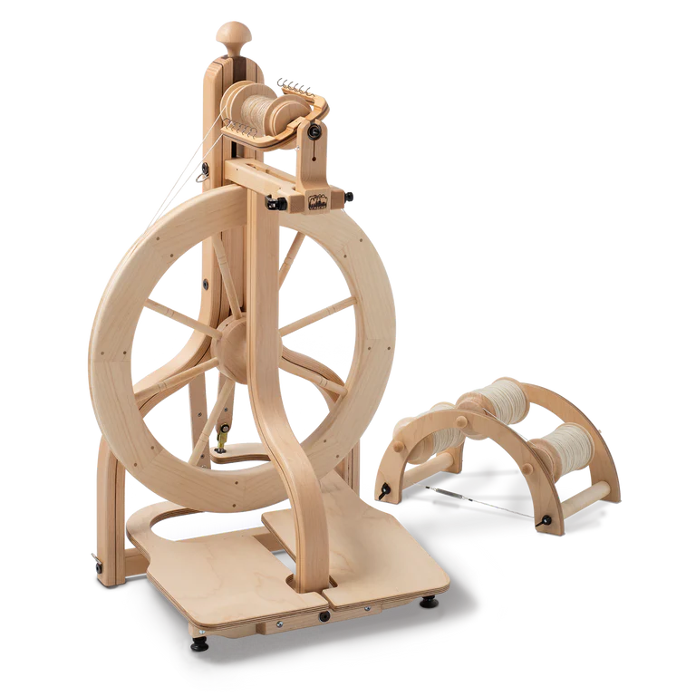 Schacht Matchless double-treadle spinning wheel in natural maple with lazy kate