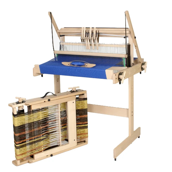 LouΓ«t Jane 8-shaft folding table loom with blue warp beside a folded Jane loom